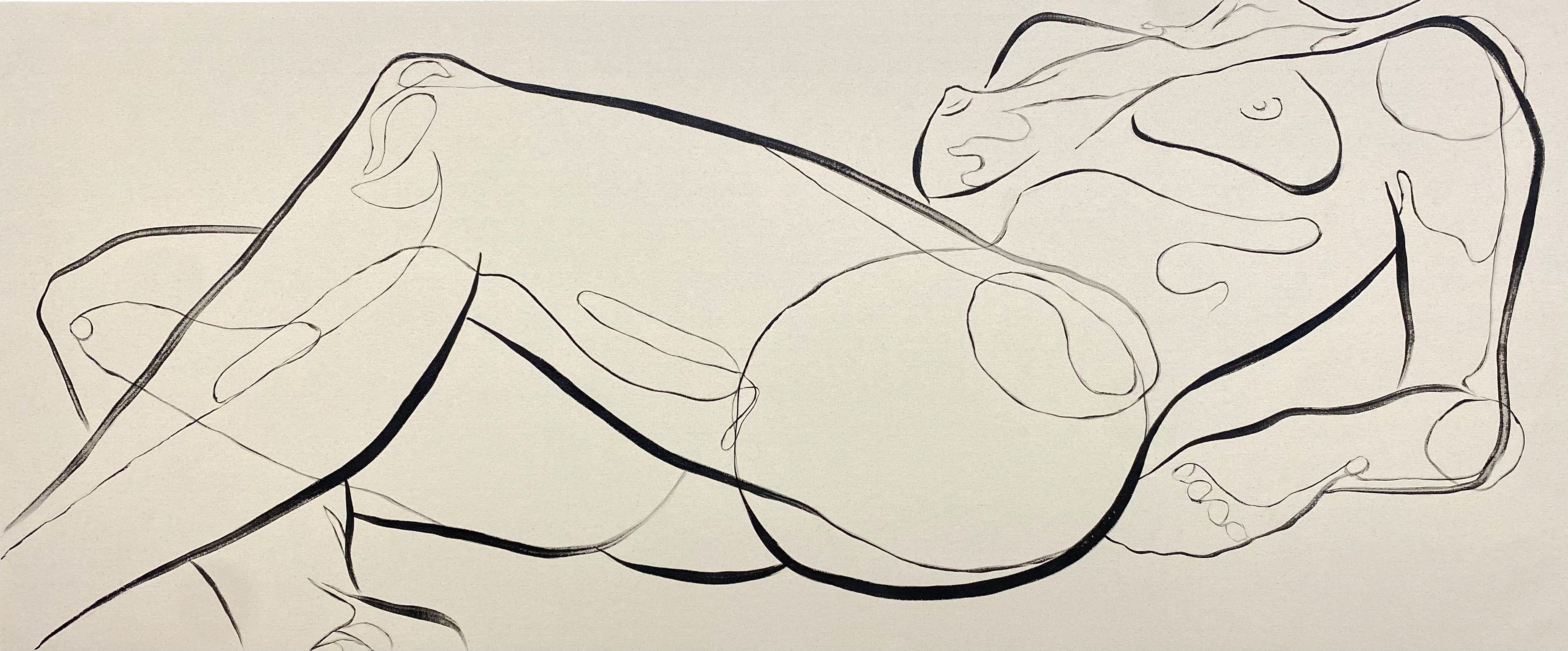 fine art portrait of a nude woman in a reclined position